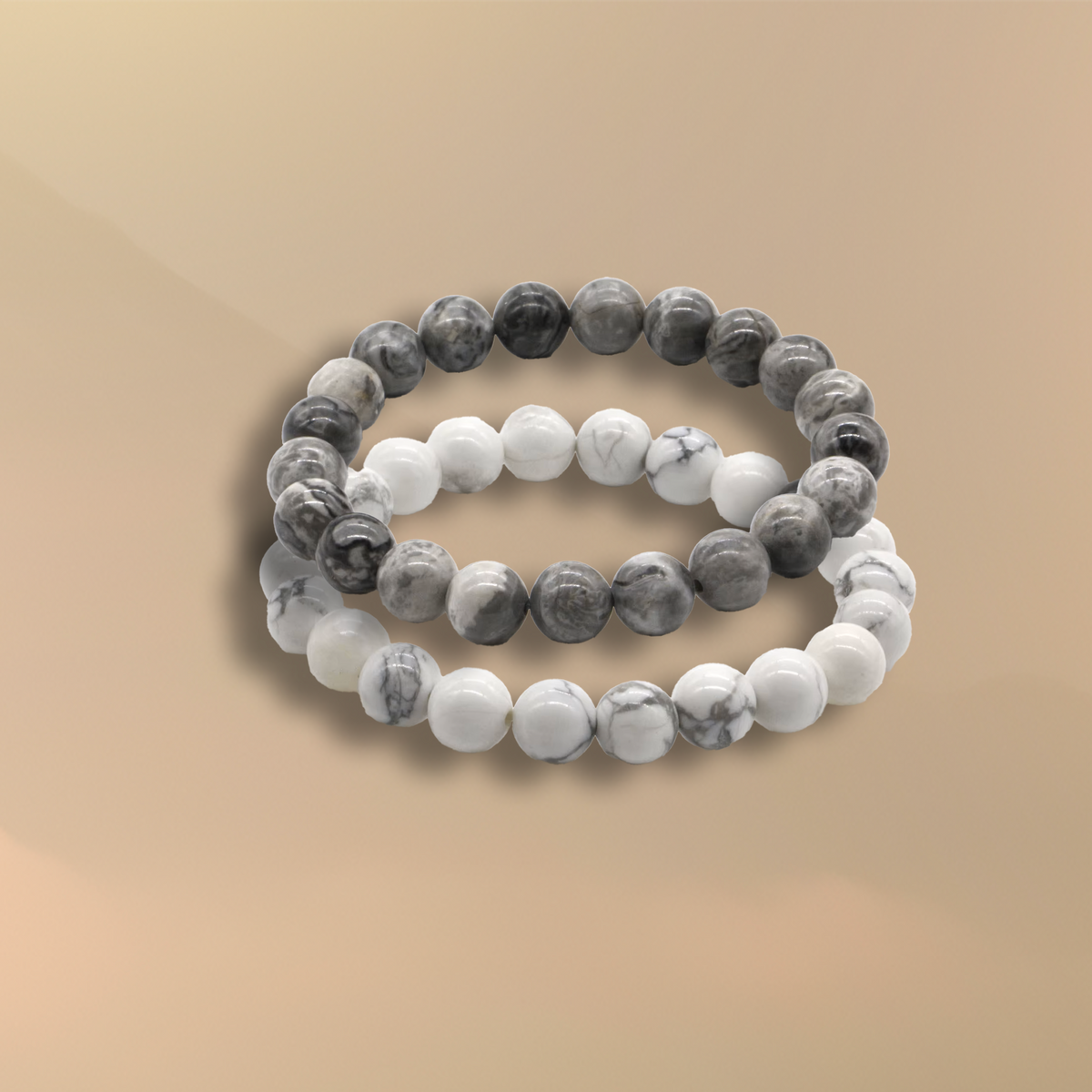Amuleto Howlite y Jasper Gris: Fuerza y Serenidad en un Solo Accesorio